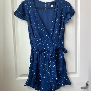 Blue flowy romper with white stars